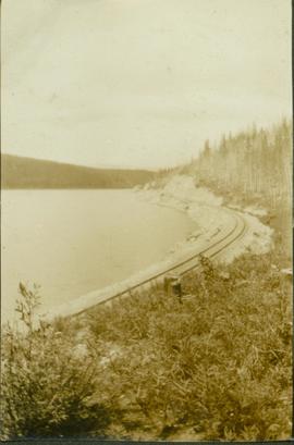 Railway track along a river's bend