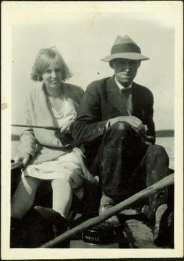 Man and Woman Sitting in Boat