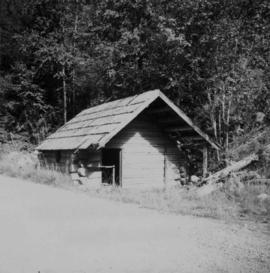 Log cabin beside lower Arrow Lake