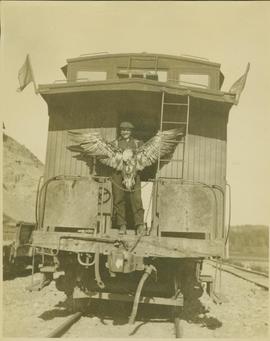 Man holding an eagle
