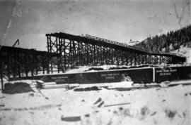 Building structure near a train in an unknown location