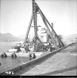 Crane and tugboat