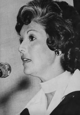 Iona Campagnolo speaking into microphone