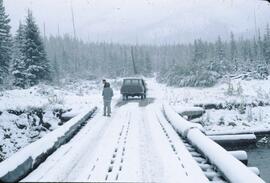 Mike Romaine and John Jungen with fall snow in Flathead Pass