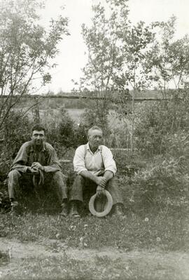 Irwin Doherty with companion in yard