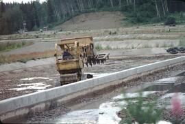Compact track loader at Fulton River Spawning Channel near Granisle