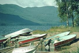 Boats on shoreline at Francois Lake