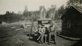 Jack Lee and Gordon Wyness with survey equipment on reserve