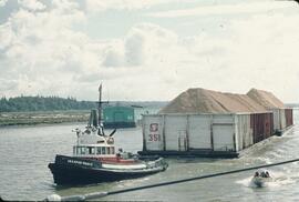 Tugboat Seaspan Prince hauling barges near New Westminster
