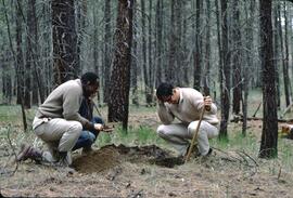 Neville Gough and Gavin Young examining soil during soil survey, Glenemma