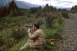Dan Blower using a spotting scope at Kinaskan