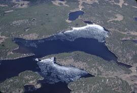 Aerial view of a frozen lake and landscape north of China Head Mountain