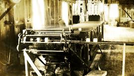 Lacquer machine in operation at cannery