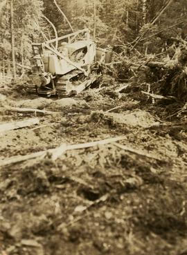 Bulldozer clearing land for road making north of Stuart Lake