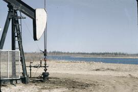 Oil well and waterfowl area at Boundary Lake