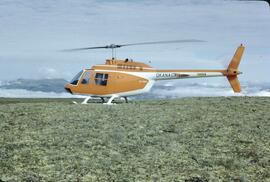 Okanagan helicopter in alpine at Coolridge Mountain