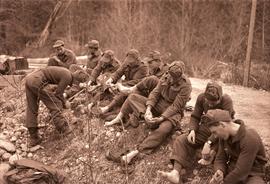 Group of soldiers caring for their feet