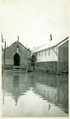 Man in Flooded Railway Camp