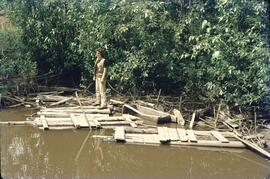 Joan Sawicki on river debris near Terrace