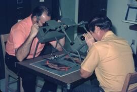 Norm Sprout & Al Dawson using Old-Delft stereoscopes in Kelowna