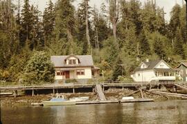 View of Bamfield docks and houses from boat