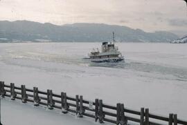 Tug breaking ice on Okanagan Lake