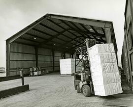 Loading prime Skeena bleached kraft pulp in bales
