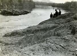 Men on the banks of the Nechako River