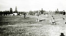Young Men's Forestry Training Program (YMFTP) crew playing baseball at Aleza Lake village