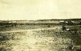 Looking north from Block 177 towards Fort Fraser townsite with view of hotel, bank and railroad grading
