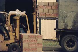 Loading canned salmon into truck at Prince Rupert