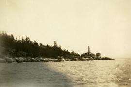 Lighthouse and rocky shore near Vancouver Island