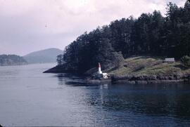 View of lighthouse in the Gulf Islands from a BC ferry