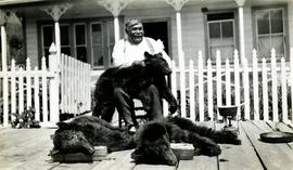 Nisga Chief Albert Allen with bear skins at Kincolith, BC