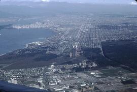 Aerial view of downtown Vancouver, Richmond, and airport lands