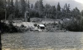 Alta Lake water tower and rail line at lake shore