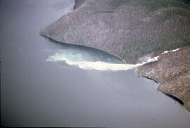 Aerial view of sediment running from stream into Quesnel Lake