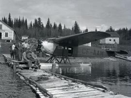 Swannell's crew next to CF-AAM float plane at Takla Landing