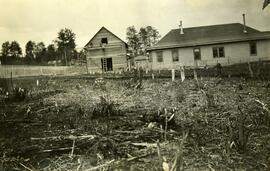 Government Agent's residence and outbuildings on Block 152 looking north from 6th Avenue, Fort Fraser