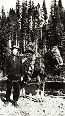 Bob St. Claire and his horse Nellie at Timber Berth 80, Bull River, B.C.
