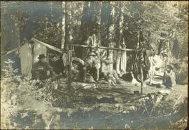 Crew Seated in Camp