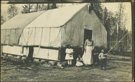 Houghtaling Family by Tent Building