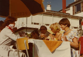 An outdoor buffet in Nova Scotia attended by Iona Campagnolo and Pierre Trudeau