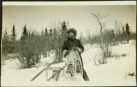 H.F. Glassey with Snowshoes near Teslin Lake, BC