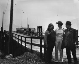 Iona Campagnolo with men in front of Skeena wharf