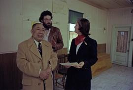 Iona Campagnolo talks with her assistant and Earl Mah in Prince Rupert's Chinese Senior Centre