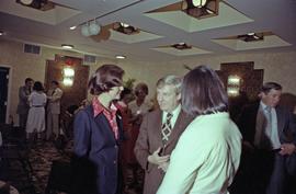 Iona Campagnolo and Premier Peter Lougheed talk with people at the Crest Hotel in Prince Rupert
