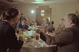 Iona Campagnolo, Premier Peter Lougheed and Mayor Peter Lester and two unidentified men talk at the Crest Hotel in Prince Rupert