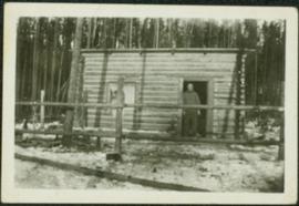 Unidentified Man at Log Building
