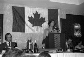 Iona Campagnolo speaking at podium at the Crest Hotel in Prince Rupert